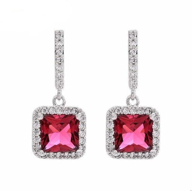 Earrings Radiant Cut Center stone.